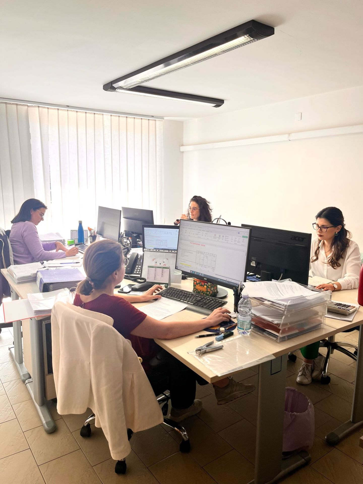 The Tour of Sicily booking team at work in our office in Sicily